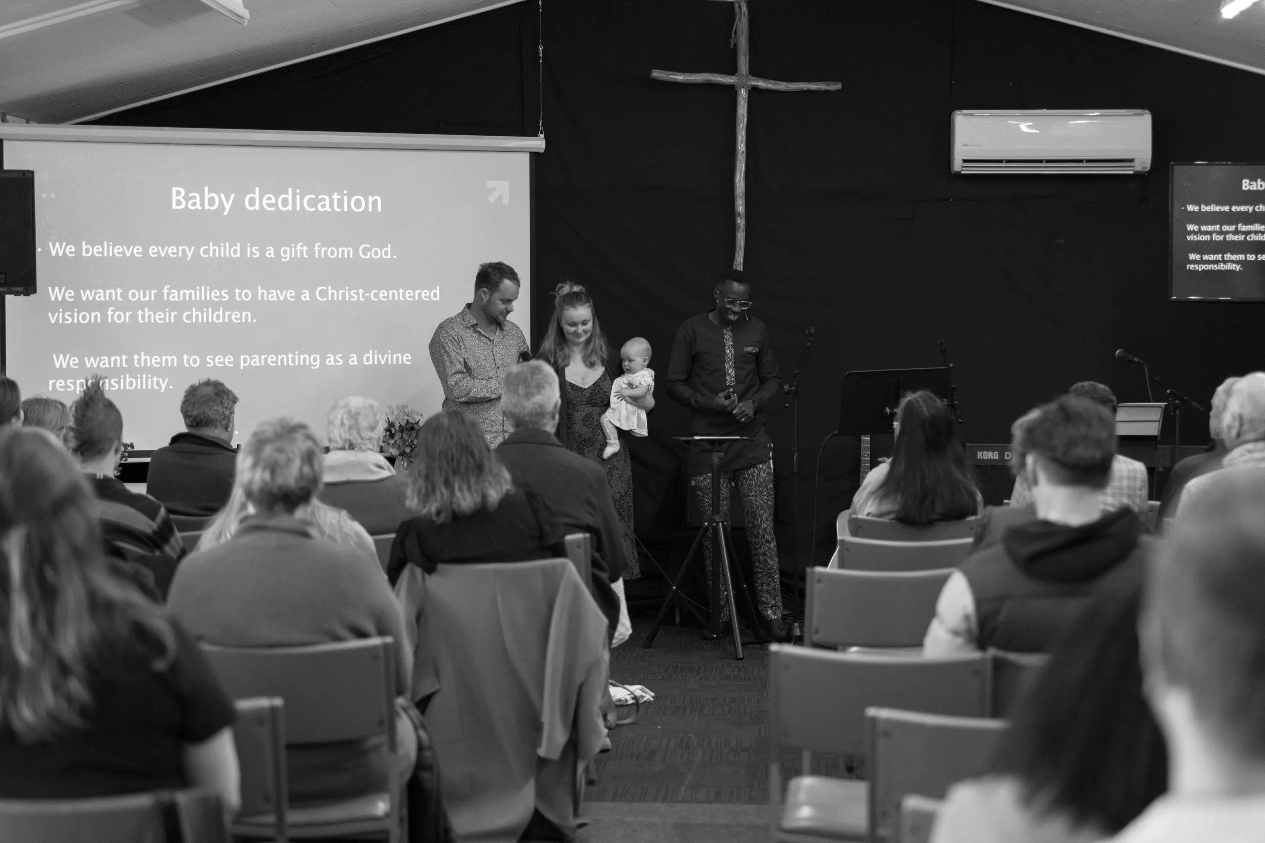 The congregation gathered for a Sunday service at Seven Oaks School